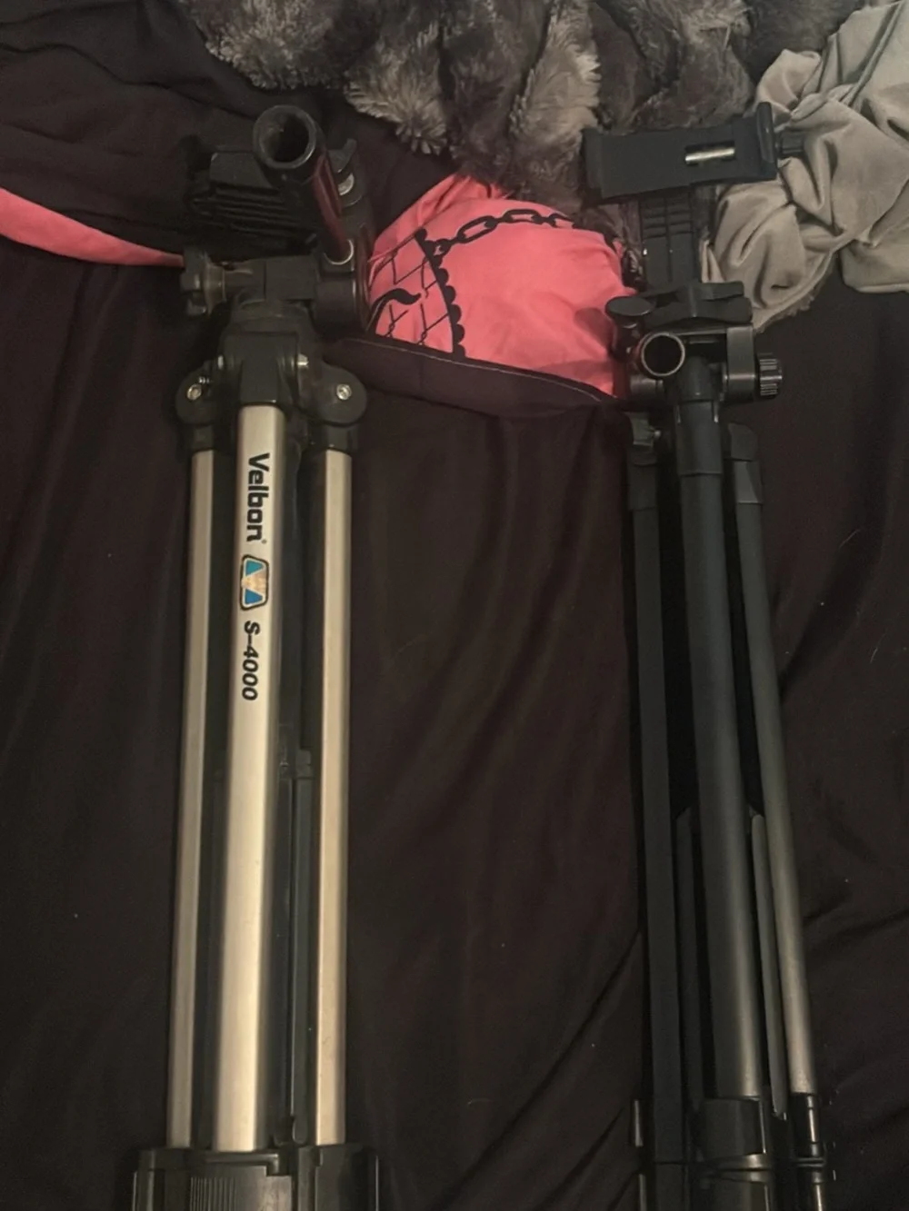 Two AE-1 Canon Film Camera’s in Black & Silver with two tripods